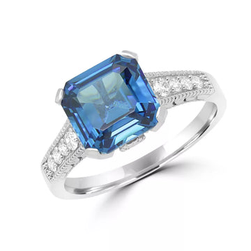 Bague exquise en zircone cubique bleue et diamant en or blanc 14 carats