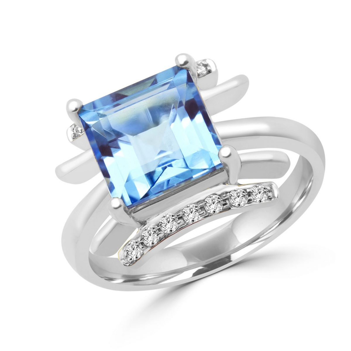 Emerald cut blue topaz & diamond cocktail ring in 10k white gold