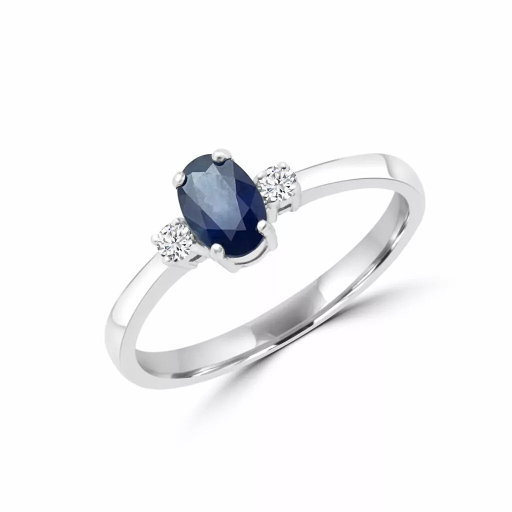 Bright blue sapphire & diamond solitaire ring in 10k white gold