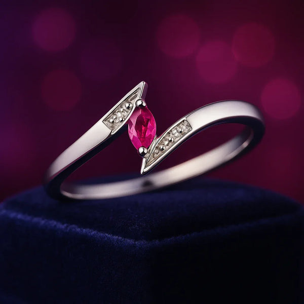 Marquise cut ruby & diamond cocktail ring in 10k white gold