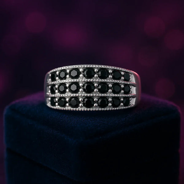 14k white gold semi-eternity ring with tree rows of black diamonds