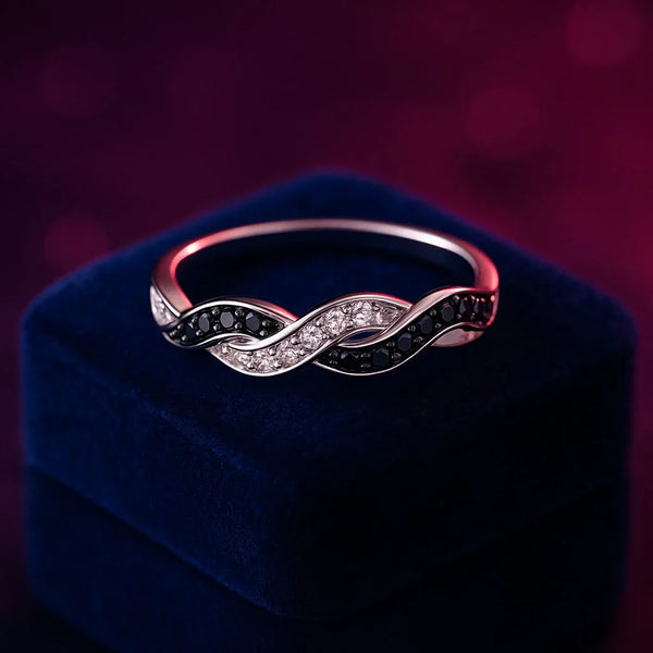 Feminine black and white diamond ring 10k white gold