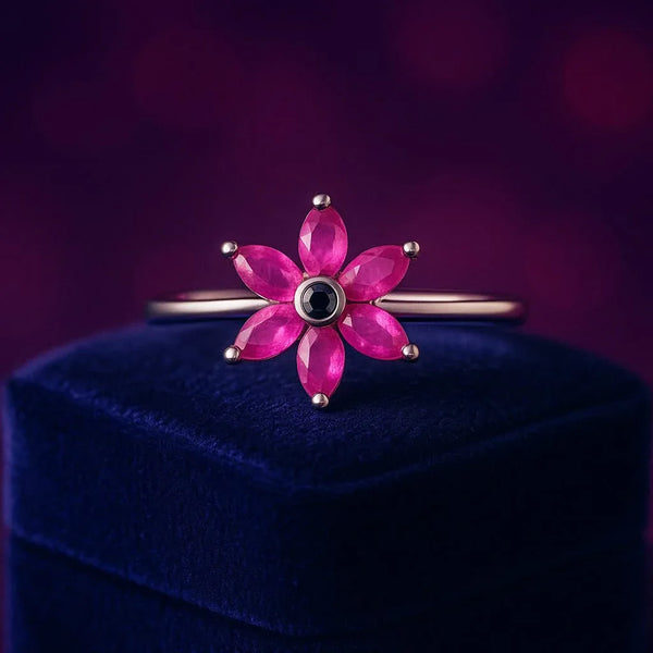 Marquise cut ruby & black diamond flower ring in 10k white gold
