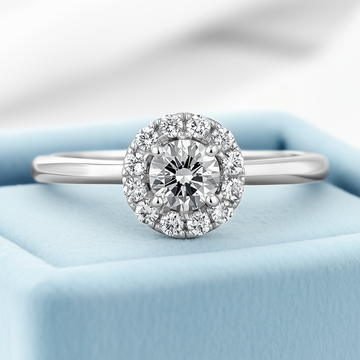 Striking halo ring 0.16 (ctw) with CZ center in 14k white gold