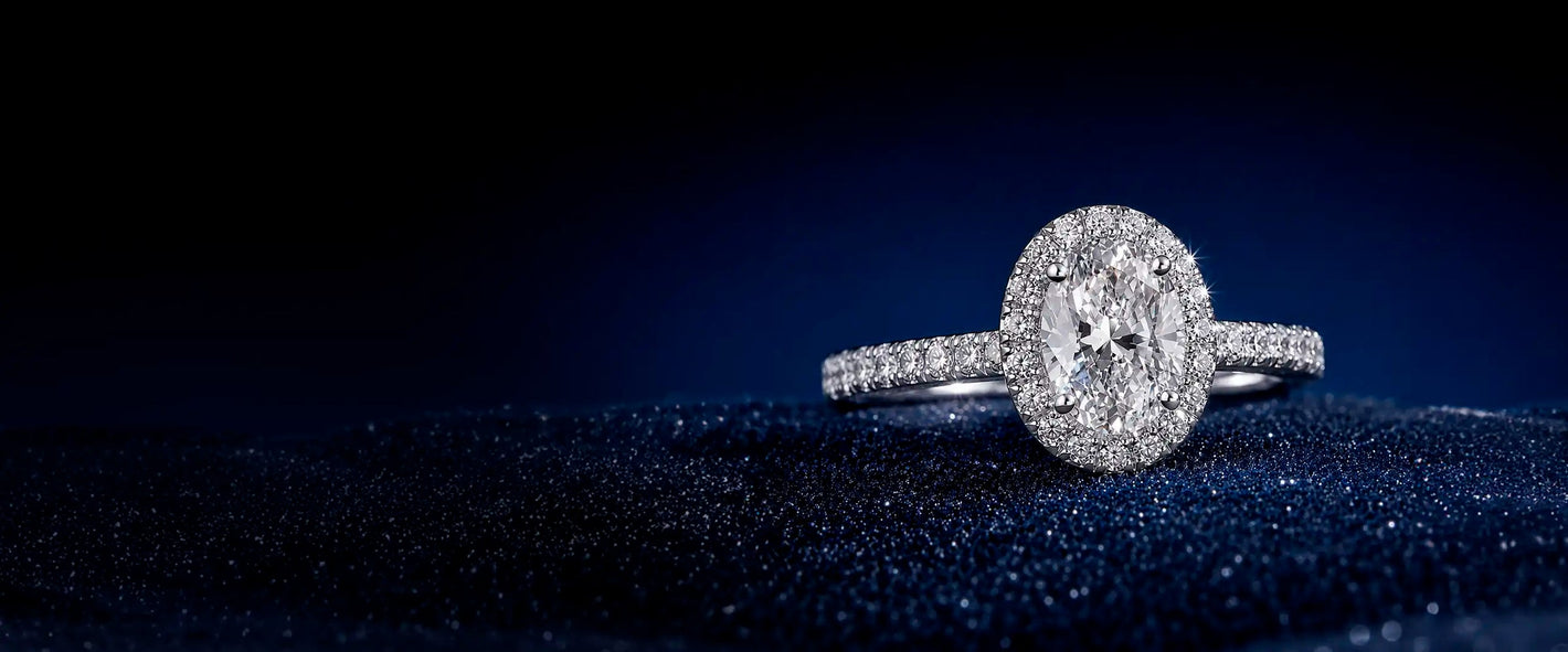 GDM halo diamond ring on a deep blue background
